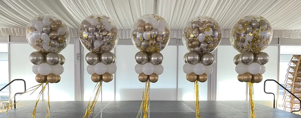 Silver and gold balloon POP drops for New Year's Eve