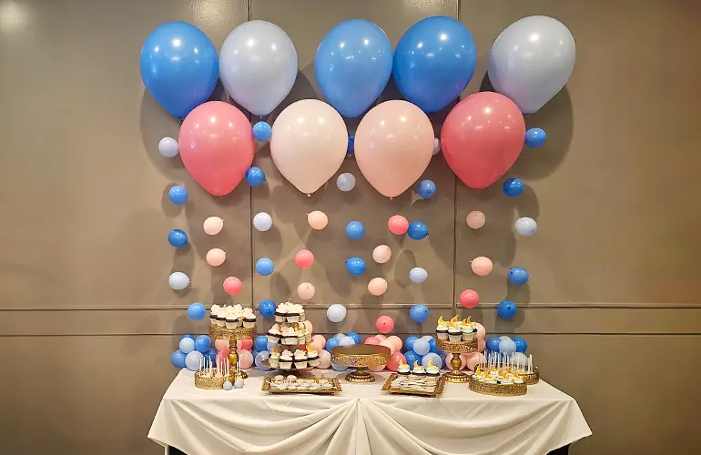 Balloon wall for snack table at a baby shower