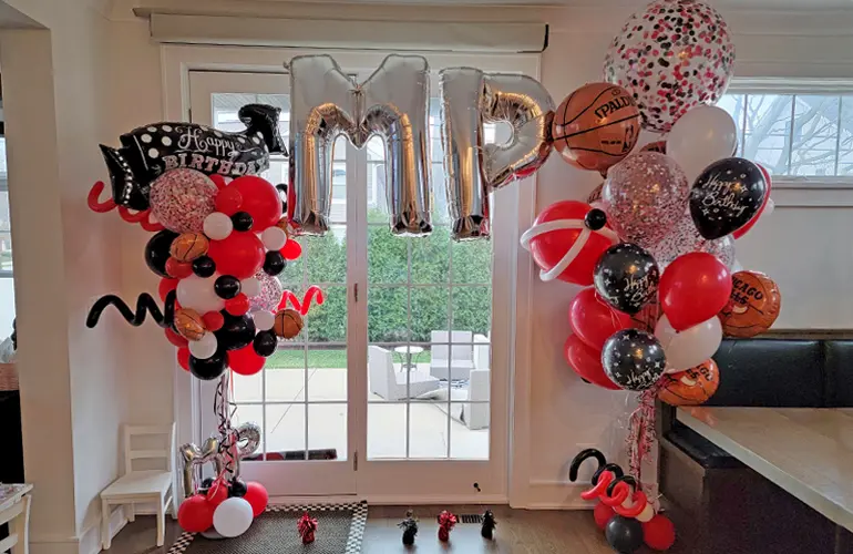 Basketball themed balloon bouquet and party column surprise