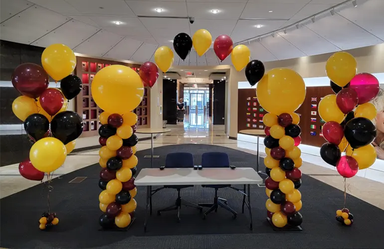 Balloon arch and bouquets for a company event