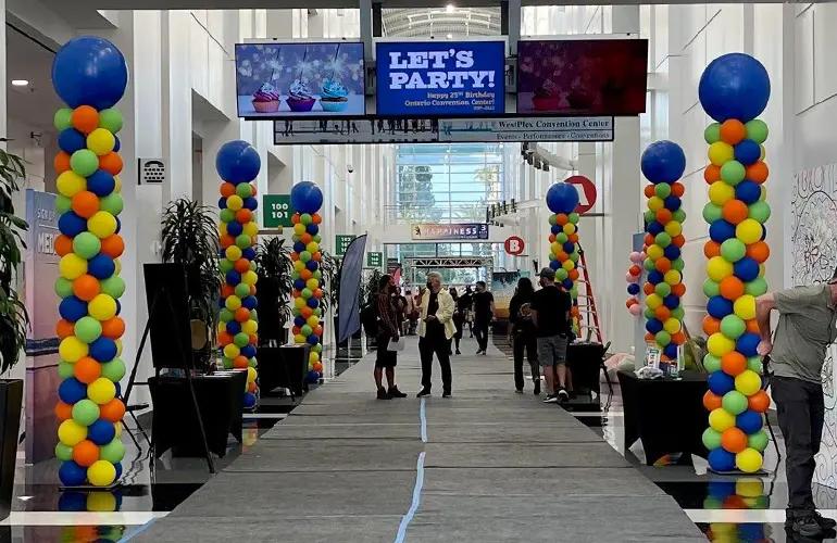 Tall balloon columns for a trade show television scene