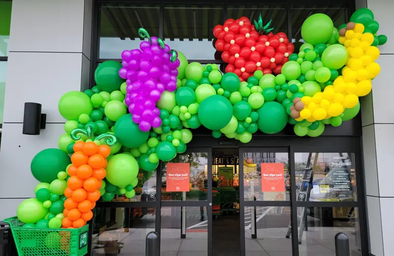 Organic balloon display outside of an Amazon Fresh for their grand opening 