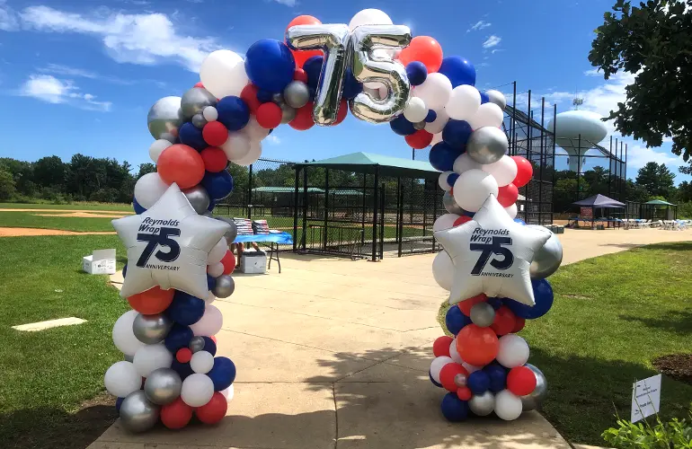 Balloon arch with custom balloons for Reynolds Wrap to celebrate their 75th anniversary