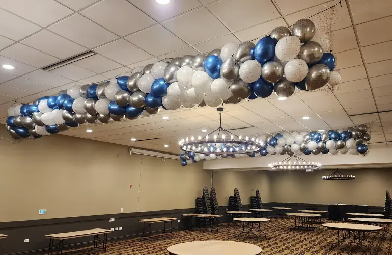 Skinny balloon drop nets in conference room
