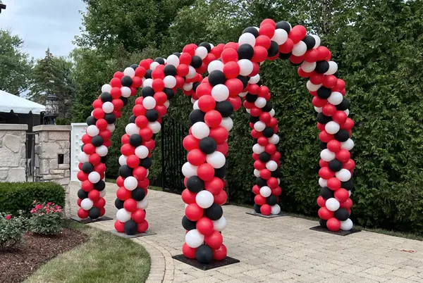 Classic balloon arches creating a tunnel