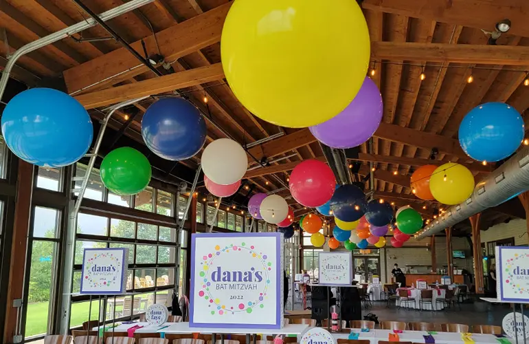 Jumbo balloons on the ceiling for a Bat Mitzvah celebration
