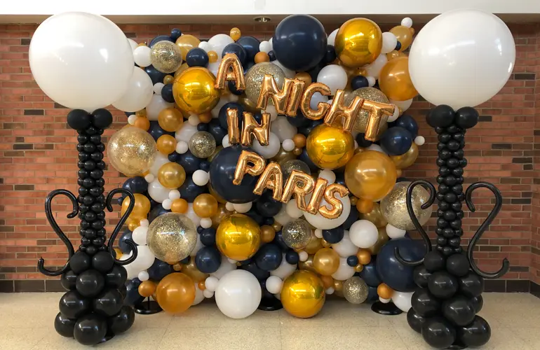 Paris themed balloon backdrop for Homecoming