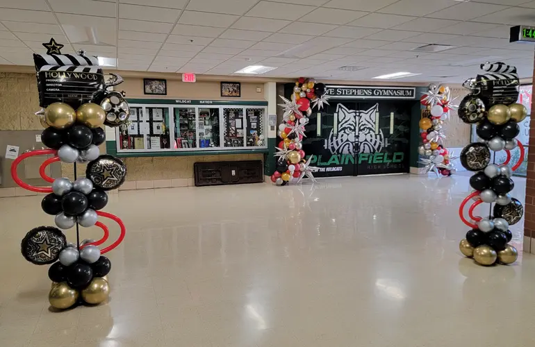 Hollywood balloon columns and garlands for school dance entrance