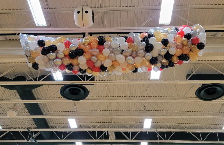 Balloon drop in high school gym