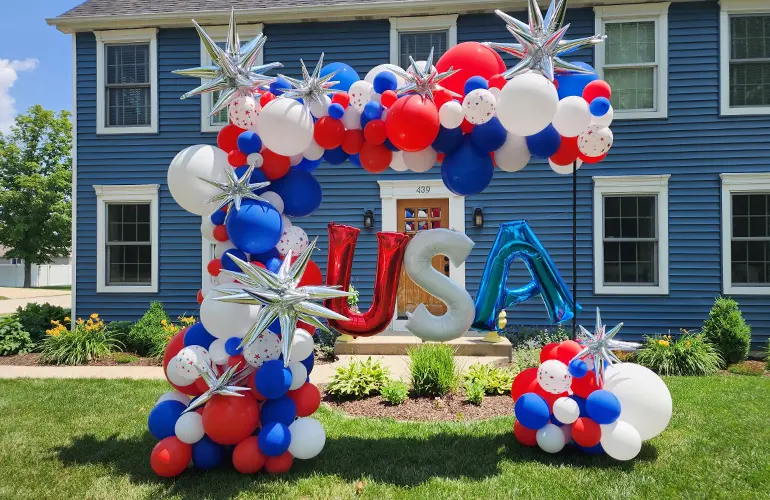 Trendy arch with USA foil balloon letters for Independence Day