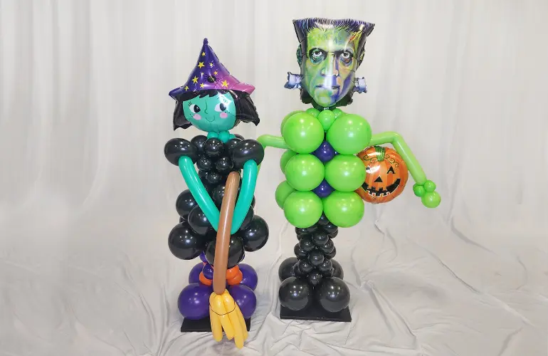 Frankie Monster and Wanda Witch Halloween balloon sculptures