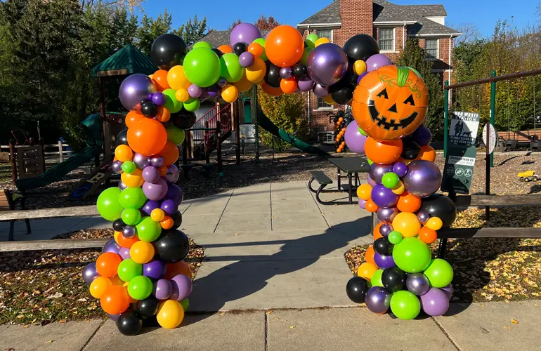 Organic balloon arch in Halloween inspired colors