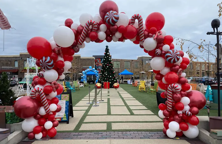 Candy Cane themed organic balloon arch