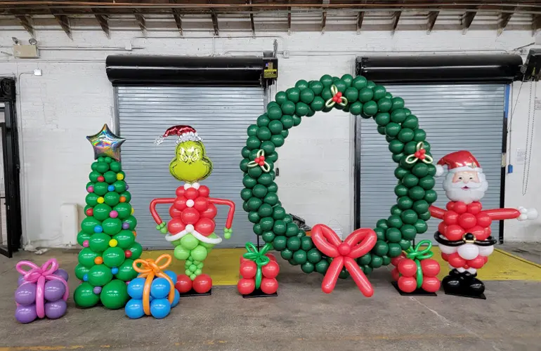 Santa and Mr Grinch balloon display