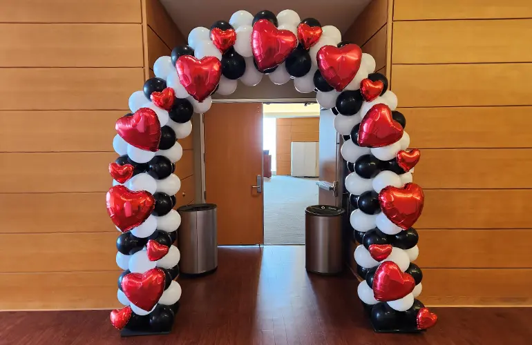 Classic balloon arch with heart balloon accents