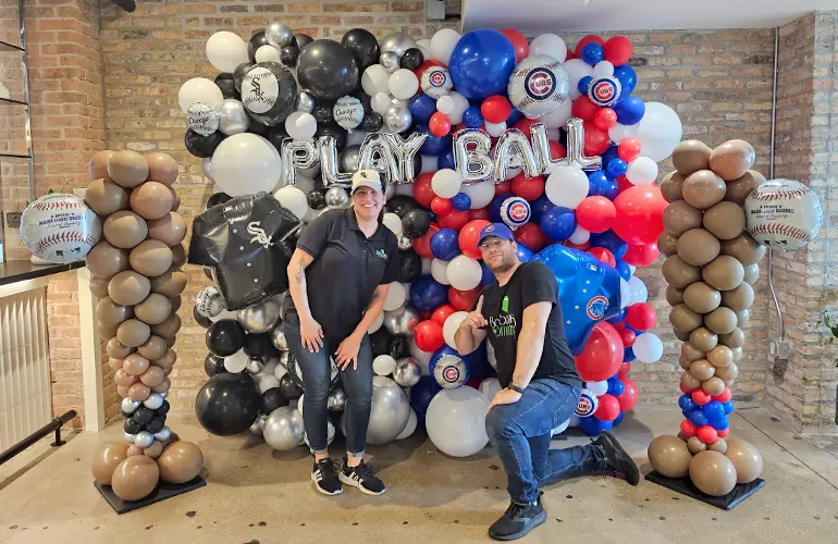 Chicago Cubs and Chicago White Sox themed balloon wall and photo backdrop