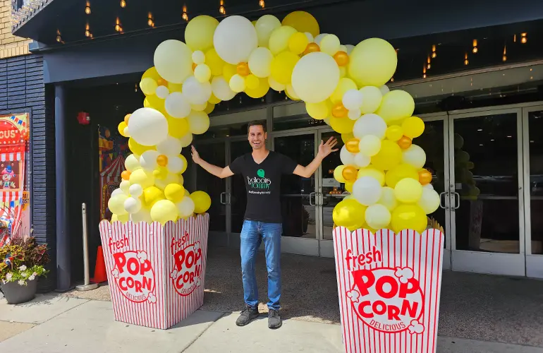 Popcorn themed organic balloon arch