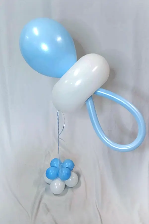 A cute helium filled pacifier balloon centerpiece