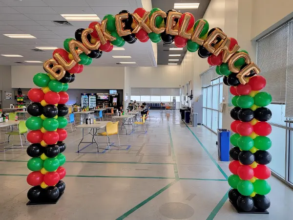 Square style balloon arch with lettering for Black History Month