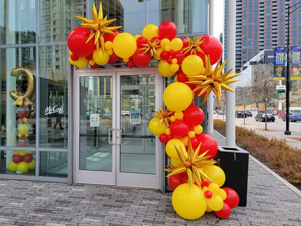 Organic balloon garland shown with add-ons