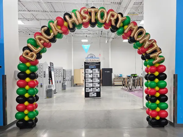 Square style balloon arch with lettering for Black History Month