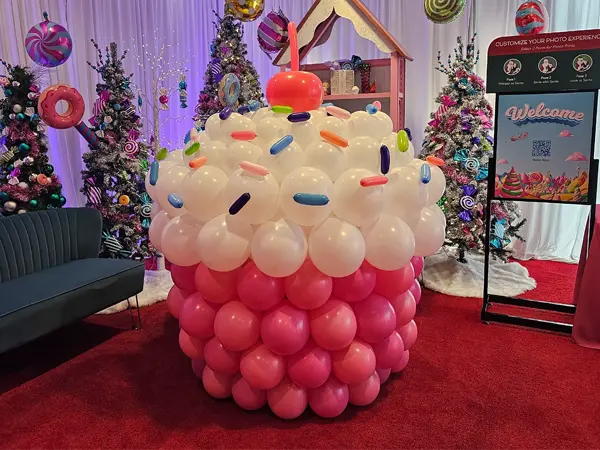Large balloon sculpture of a cupcake