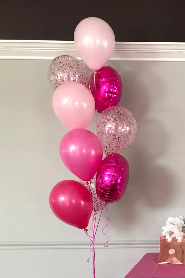 Balloon bouquet with a confetti balloon on top 