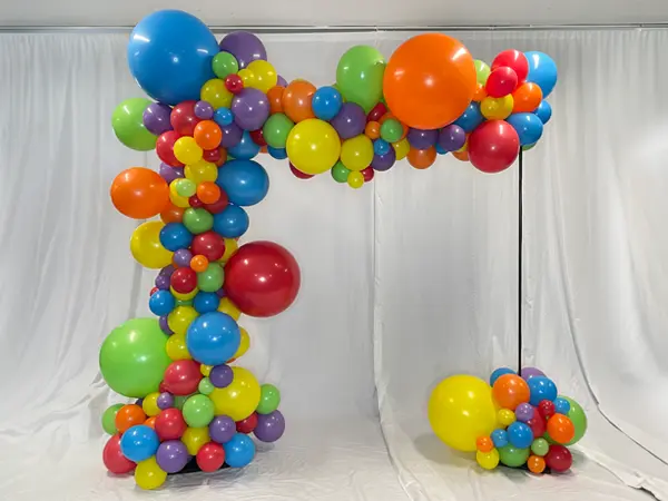 8ftx8ft organic trendy balloon arch in bright colors perfect for candyland themed parties and events
