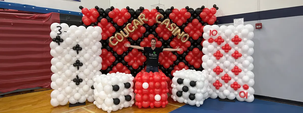 A huge balloon display for casino night themed events serving as both decor and photo backdrops