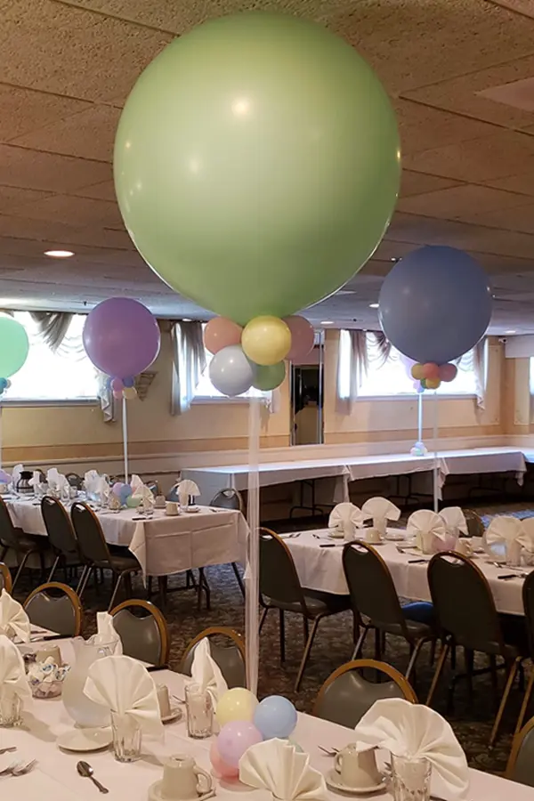 Tulle on helium filled jumbo balloon to create an elegant centerpiece