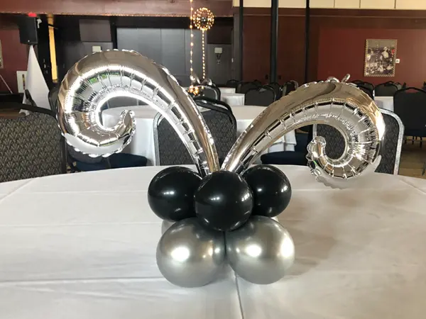Mini foil curl balloons creating a balloon centerpiece