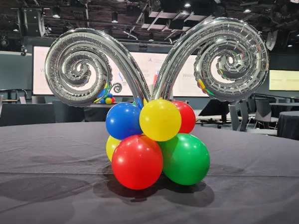 Mini foil curl balloons creating a balloon centerpiece