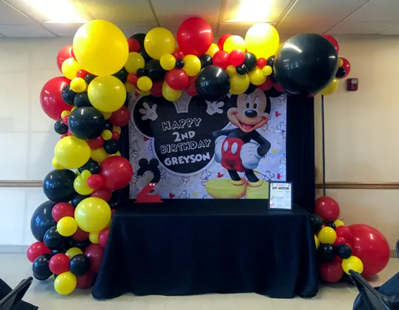 Trendy balloon arch for a Mickey mouse themed birthday