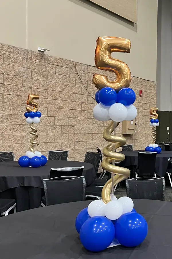 pedestal centerpiece with numbers on top