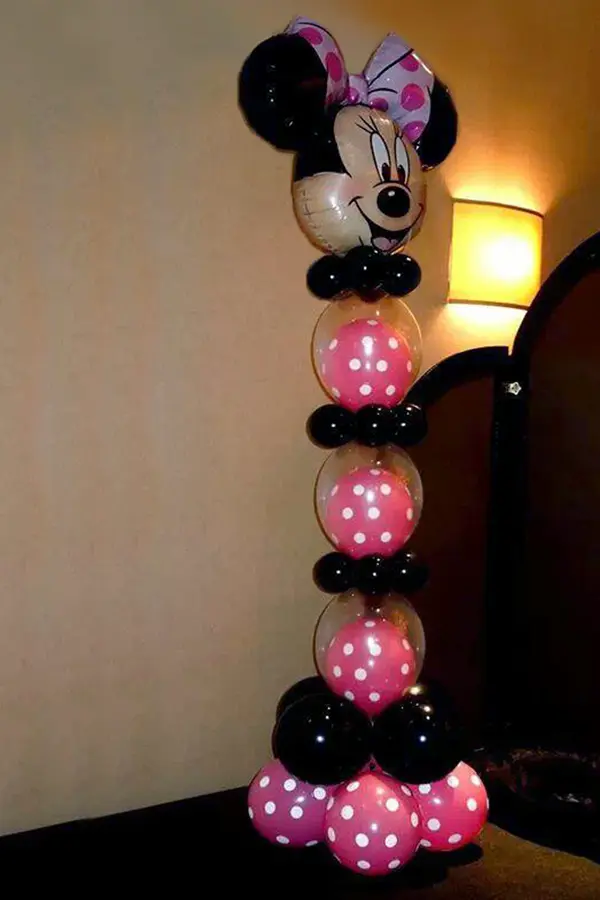 Balloon centerpiece created to look like the head of Mickey or Minnie Mouse 