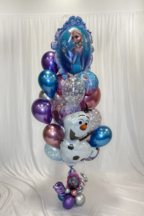 A whimsical balloon bouquet that uses multiple sized balloons