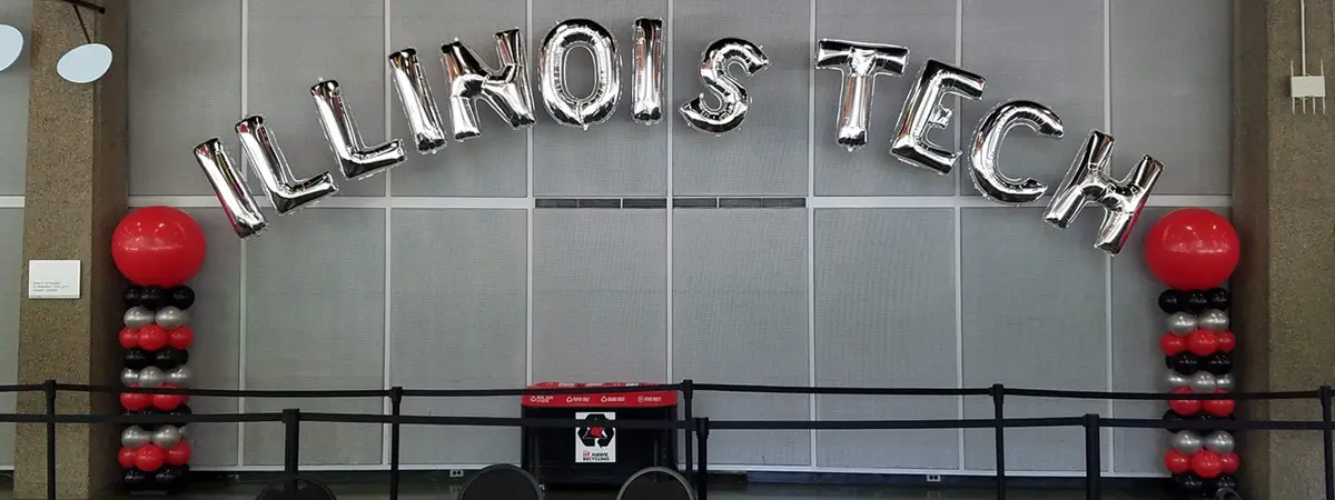 Column arch with foil balloon letters 