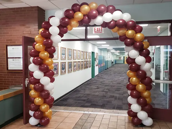 Classic balloon arch in school colors