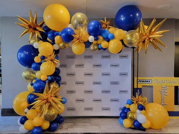 8ftx8ft Trendy balloon arch with foil starbursts and glitter balloon accents