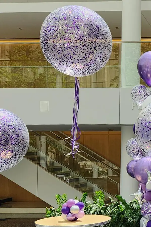 Single jumbo balloon full of helium and glitter for room decoration
