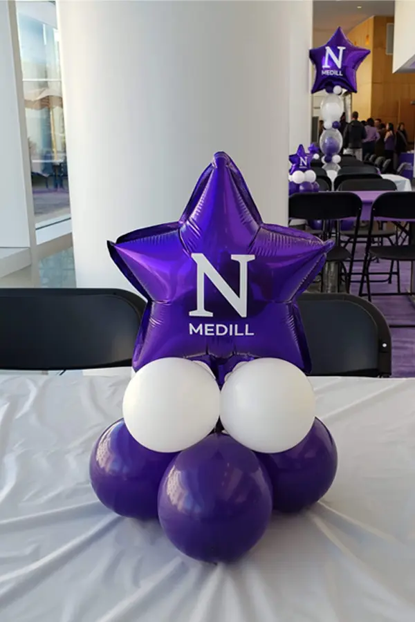 Small balloon centerpiece with mini foil shape topper
