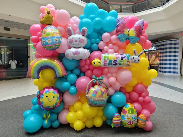 Organic balloon wall with easter foil balloons