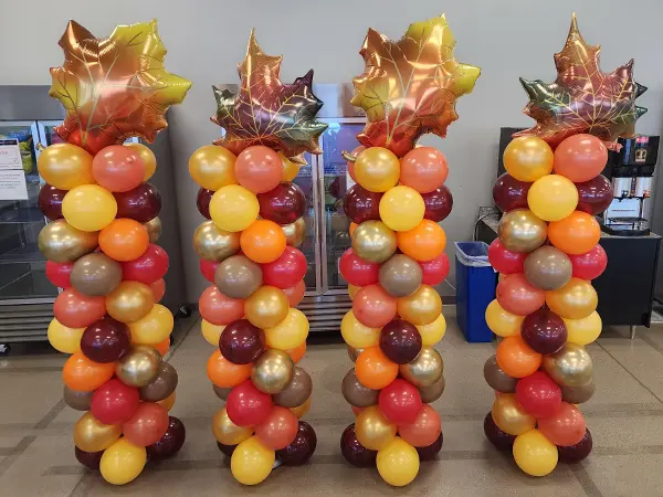 Classic balloon column with foil leaf topper