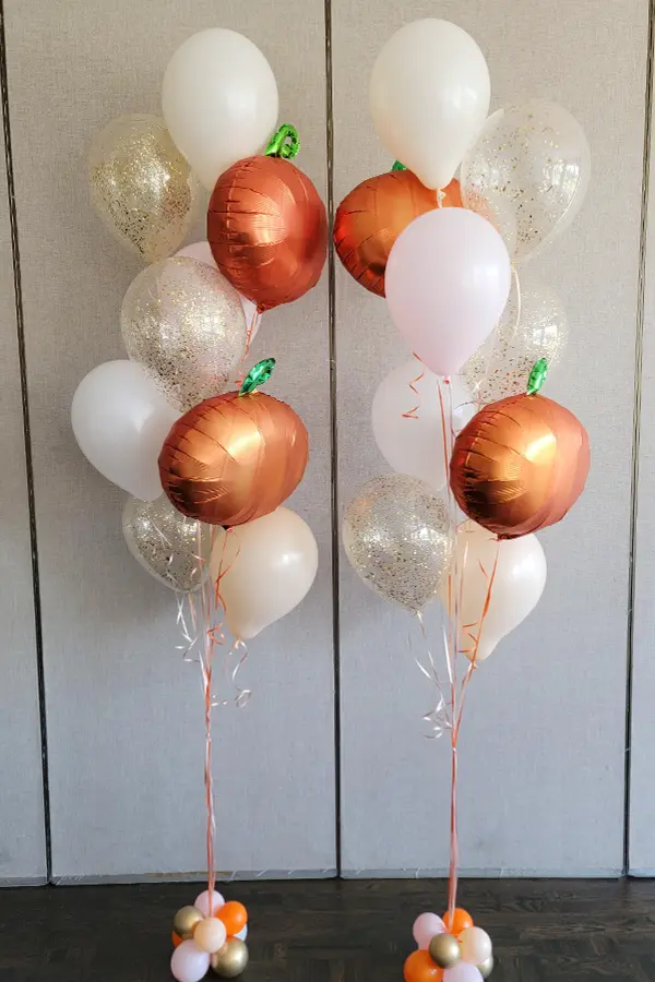 Sparkly balloon bouquet with glitter and pumpkin foil balloon accents