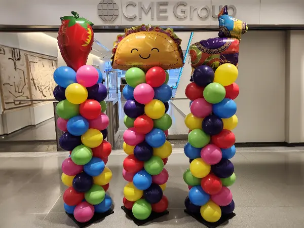 Classic balloon column in bright colors with Fiesta themed foil shape toppers