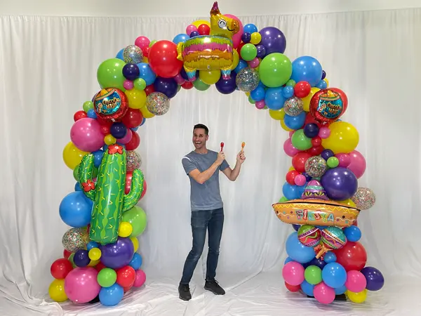 8ftx8ft Themed organic arch with foil accents for Fiesta themed parties