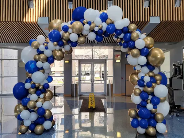 Organic balloon arch spanning 10ft wide