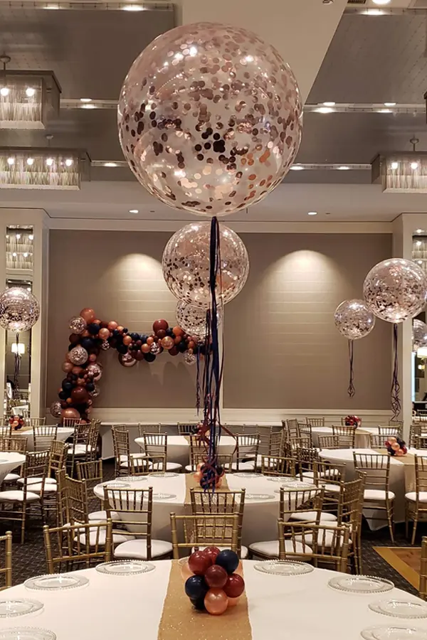 A jumbo 30in clear balloon filled with confetti to add sparkle to the room.