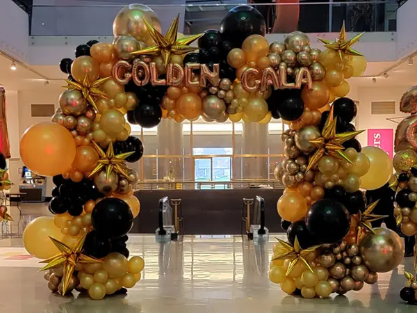 A stunning, highly customizable, and stylish balloon arch ideal for entryways or photo backdrop decorations