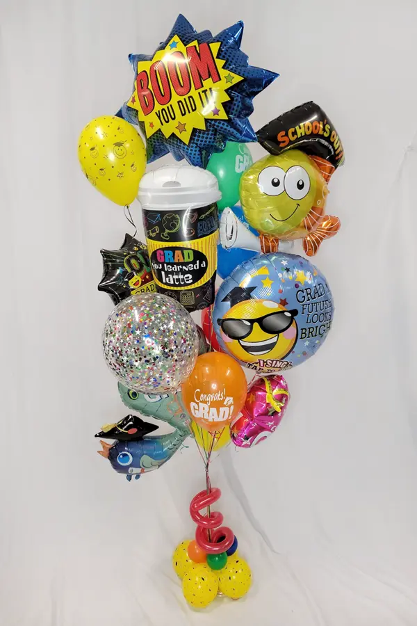A bouquet full of silly and fun graduation themedfoil balloons